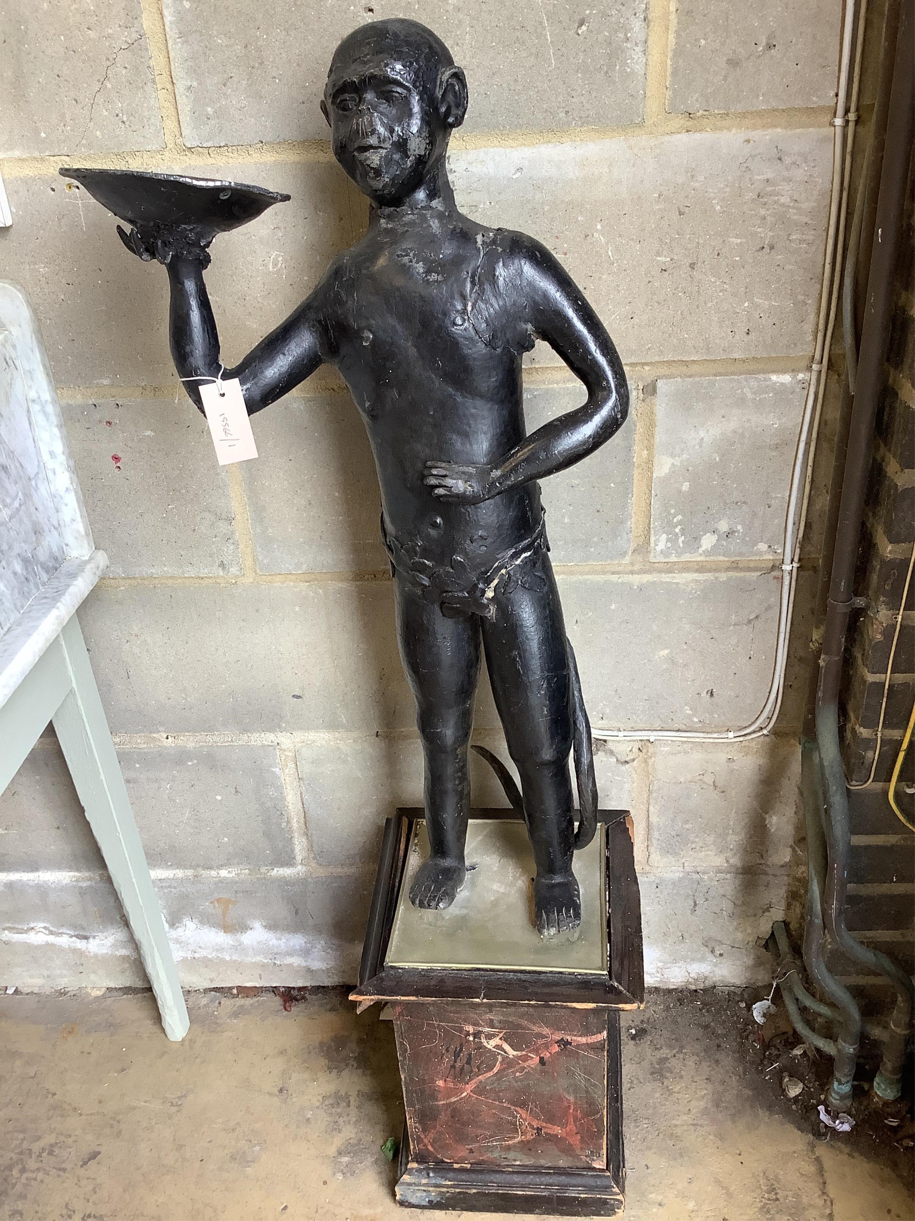 A Victorian black painted lead figure of an imp, on faux marble pedestal, overall height 126cm. Condition - poor